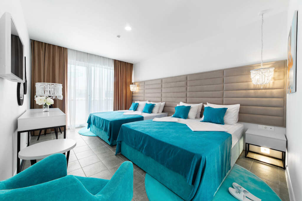 Deluxe Family room with balcony and beachfront Bora-Bora Hotel