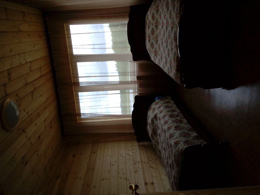 Кровать в общем номере Гостевой Дом Селигер 24