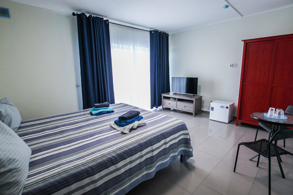 Habitación doble Confort con balcón y con vista Maverik Haus Mini-Hotel