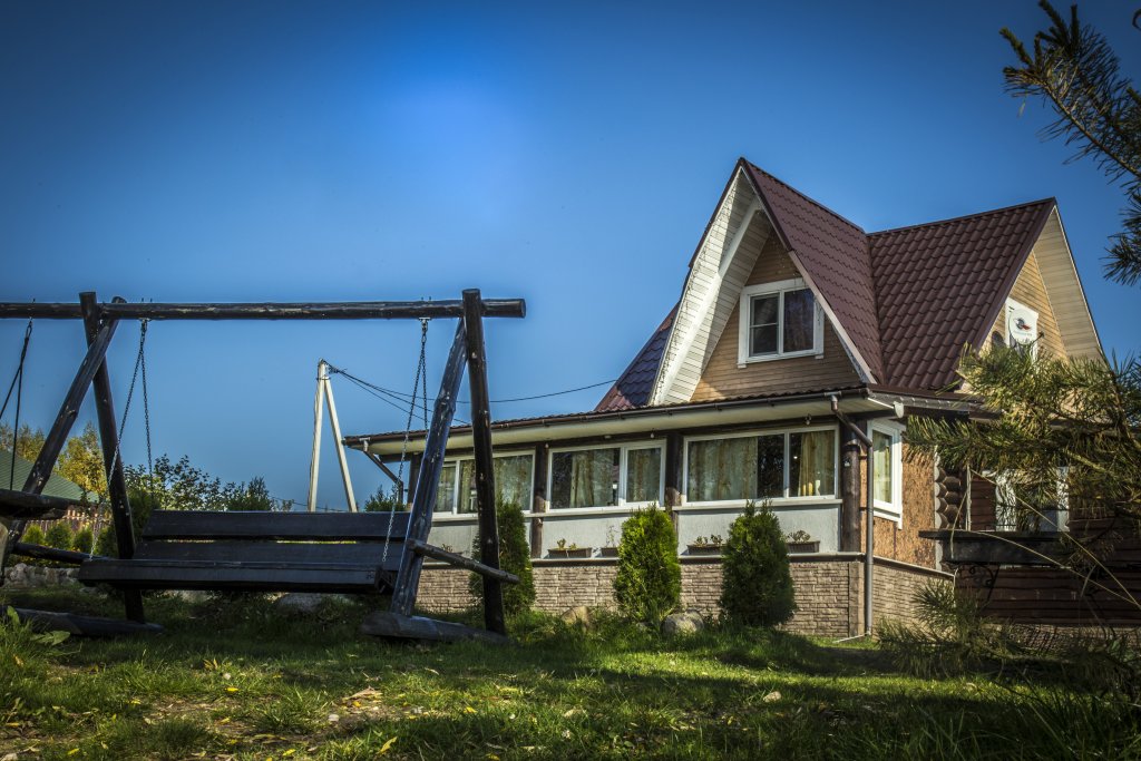 Hütte Doppelhaus mit Seeblick Гостевой двор хутор Скреблово