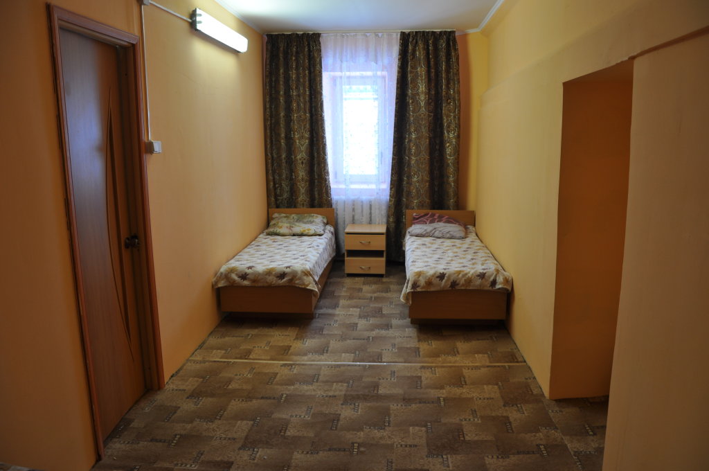 Кровать в общем номере Гостиница Вокзальная
