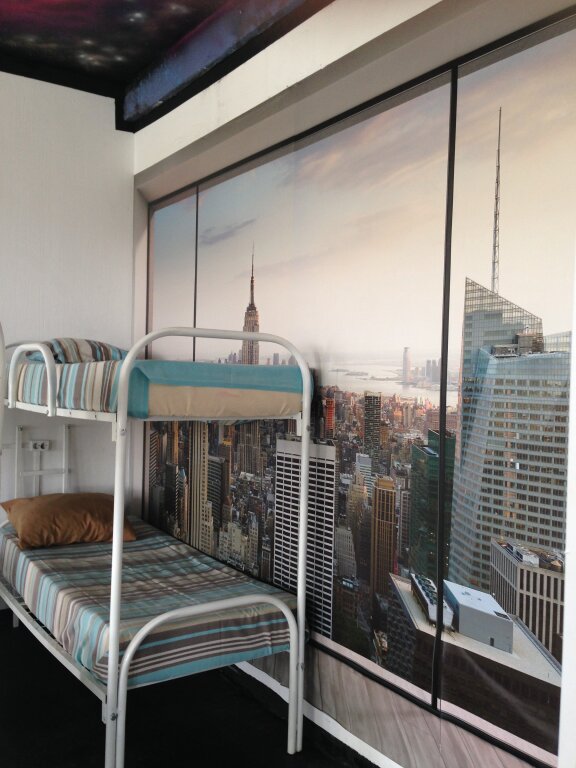 Кровать в общем номере с балконом Red Star Hostel