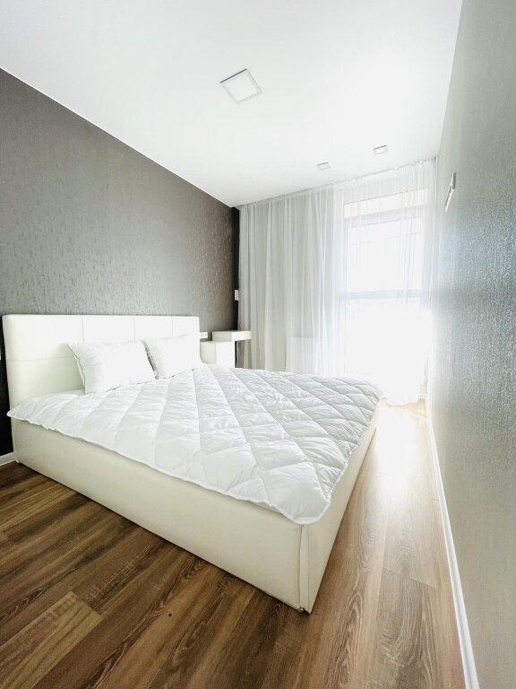 Suite familiar con balcón y con vista a la ciudad A Pearl In The Minsk World  Mybookingby Apartments