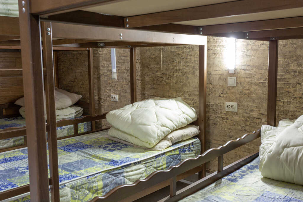 Кровать в общем номере Отель Олимпик