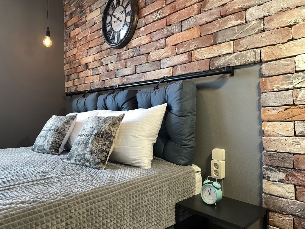 With Clock in Loft Style Apartment