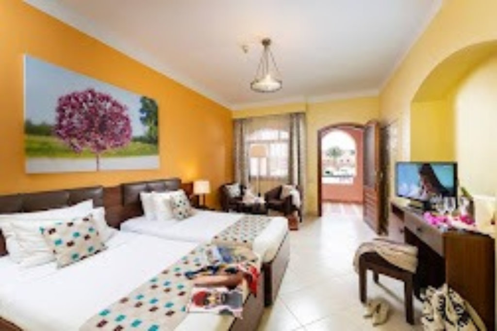 Premium triple chambre avec balcon Three Corners Rihana Resort
