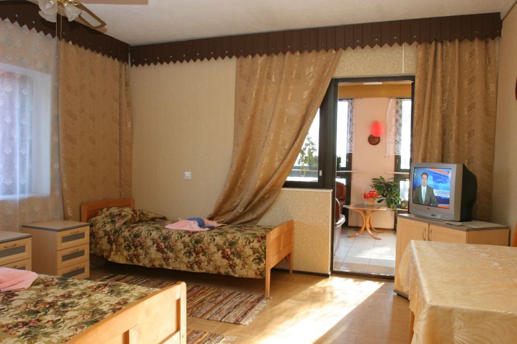 Кровать в общем номере Turusticheskiy complex Fregat