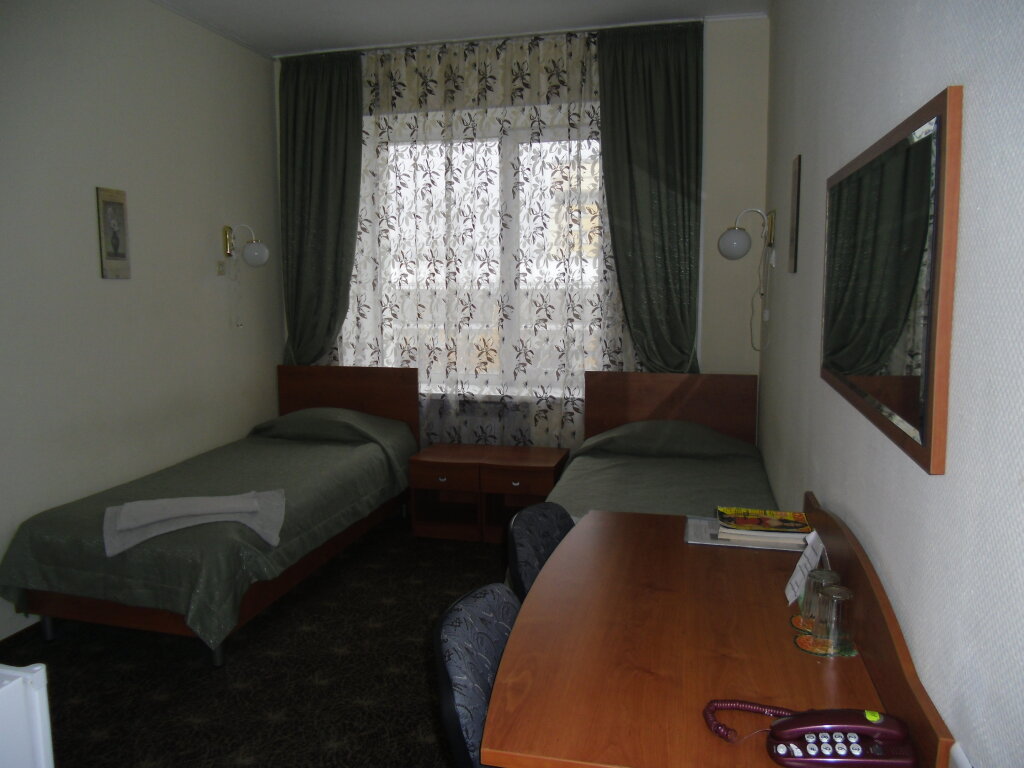 Standard quadruple chambre Alfa Hotel