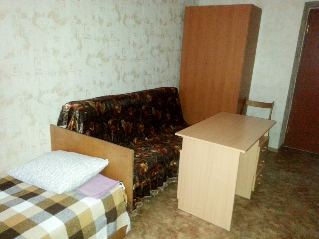 Кровать в общем номере Гостевой Дом Надежда