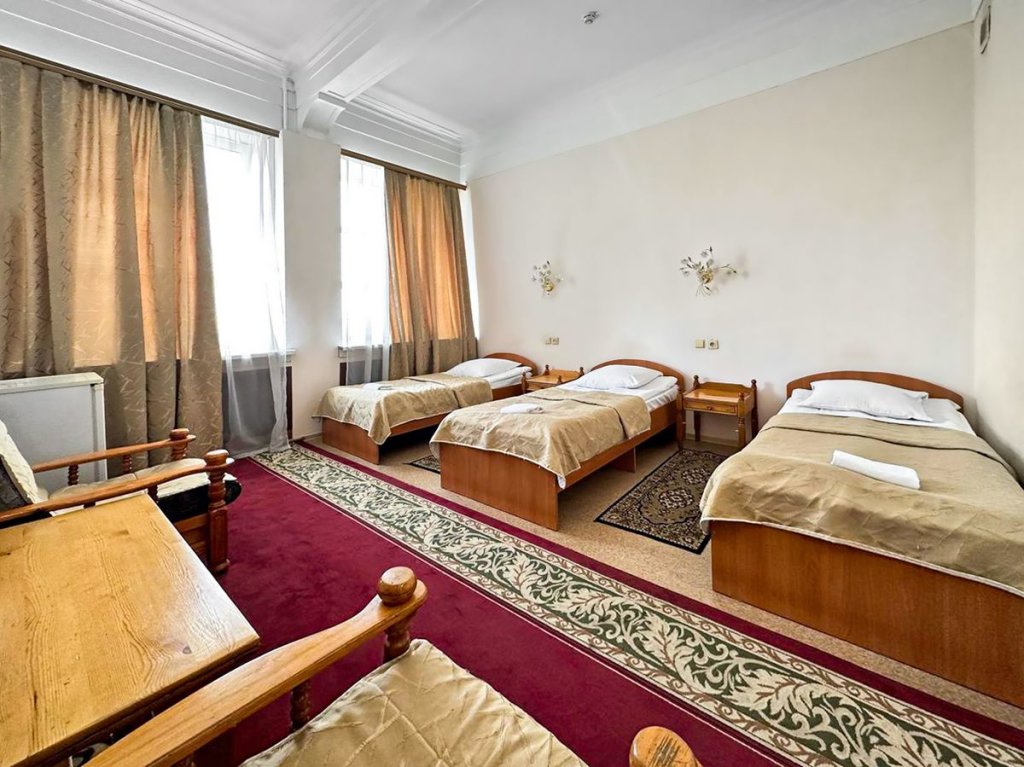 Кровать в общем номере Smart Hotel КДО Новосибирск