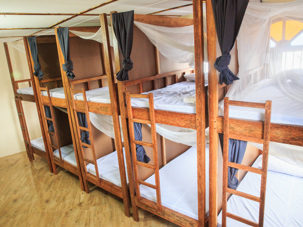 Кровать в общем номере Ten to Ten Stone Town Zanzibar