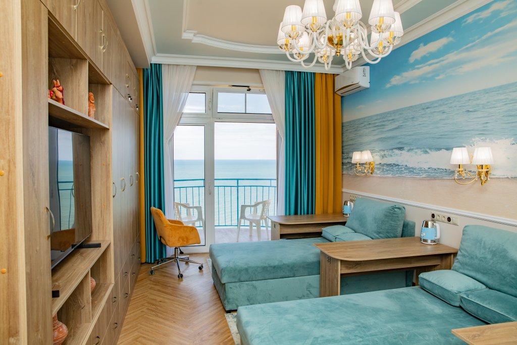 Superior Triple room with balcony and with sea view Priboy 05 by the sea dlya otdykha i ozdorovlenia Apart-Hotel