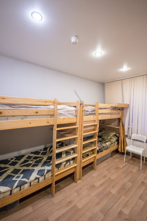 Cama en dormitorio compartido (dormitorio compartido masculino) con vista Hostel Rational Mitino