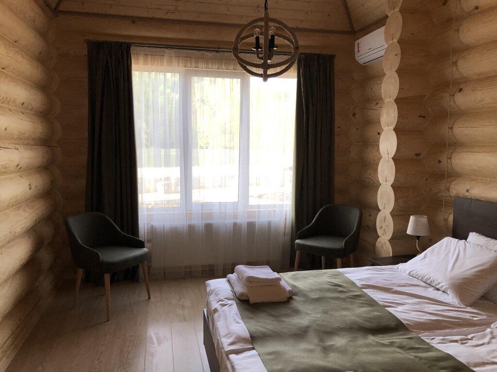 In pine log house Doppel Suite Hotel Verhnie Golubyye Ozyora