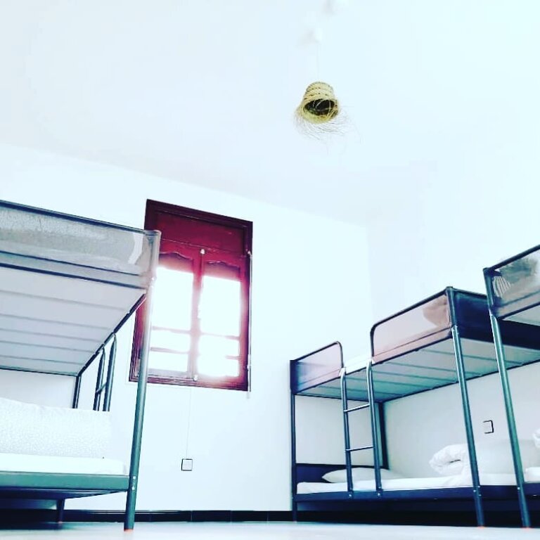 Кровать в общем номере (мужской номер) V&D Tamraght Surfers Hostel