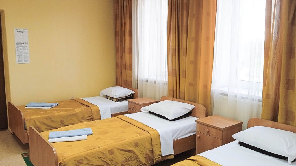 Кровать в общем номере Smart Hotel КДО Брянск