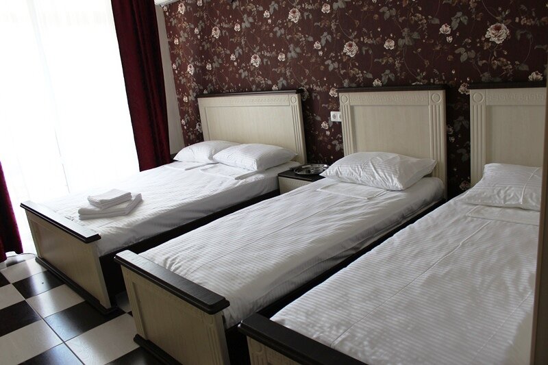 Standard quadruple chambre avec balcon Acropol Guest House