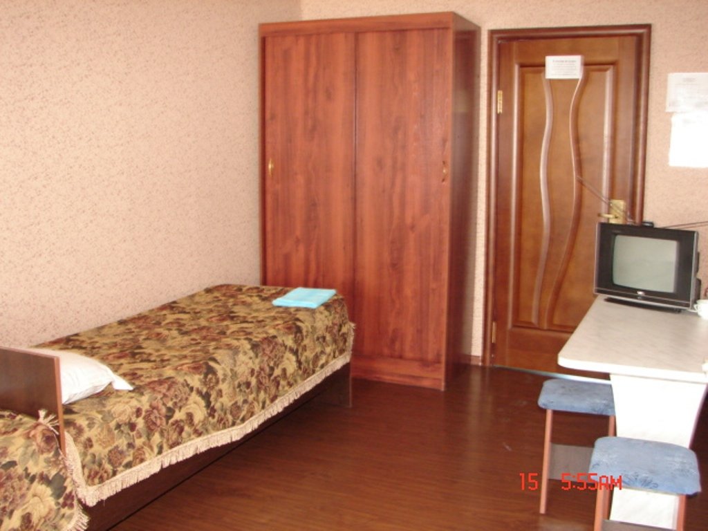Кровать в общем номере с видом на город Белый Камень