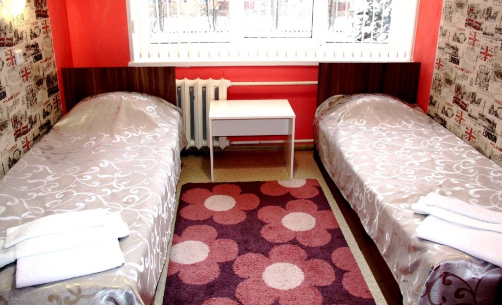 Bett im Wohnheim mit Blick Oasis Hotel - Hostel