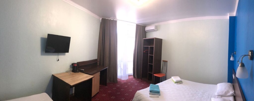 Standard Triple room with balcony and with courtyard view La Costa hotel