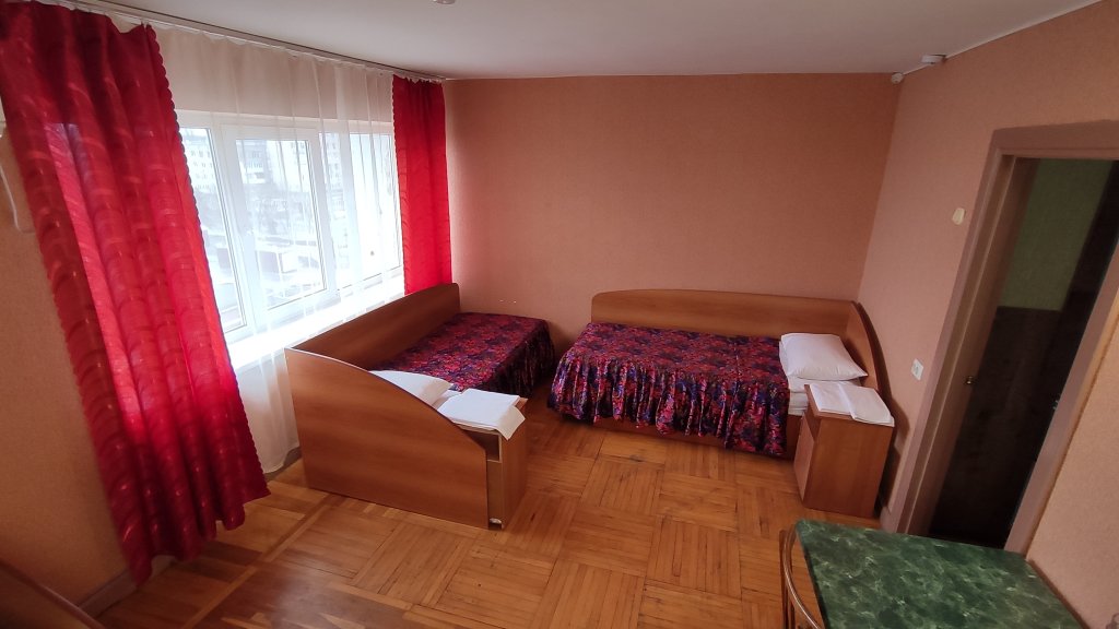 Кровать в общем номере Отель Новочеркасск