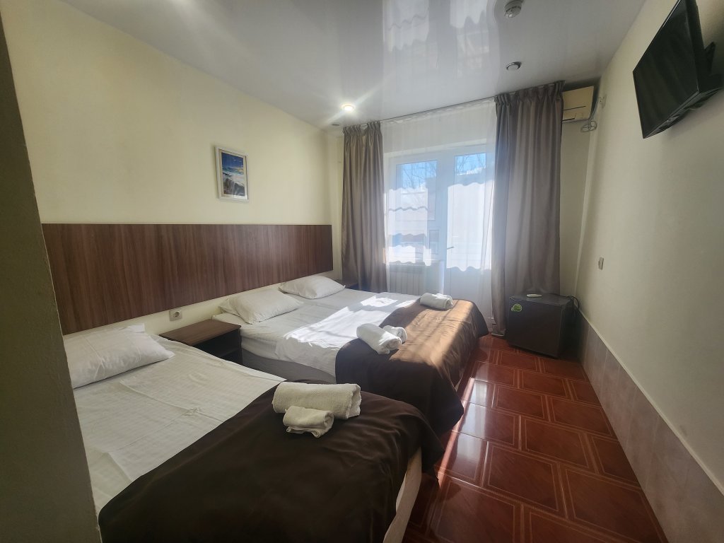 Standard Triple room with balcony Ostrovok Hotel
