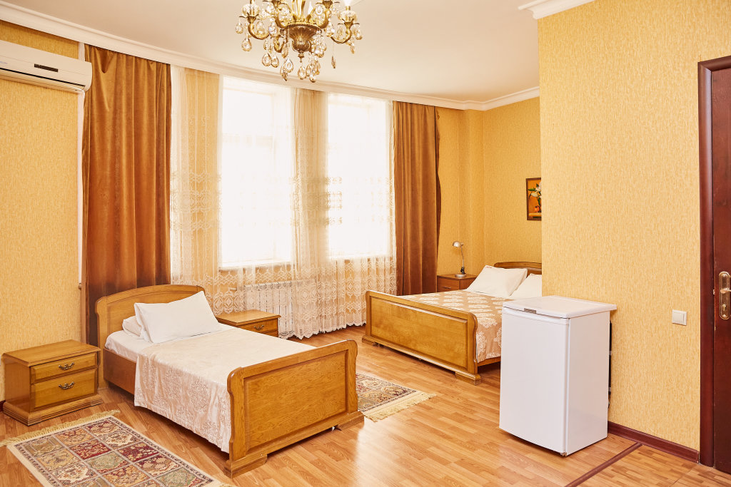 Standard Triple Family room with city view Tarkho Hotel