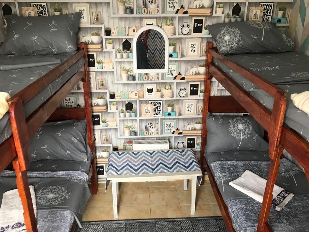 Кровать в общем номере Гостевой дом Чайка