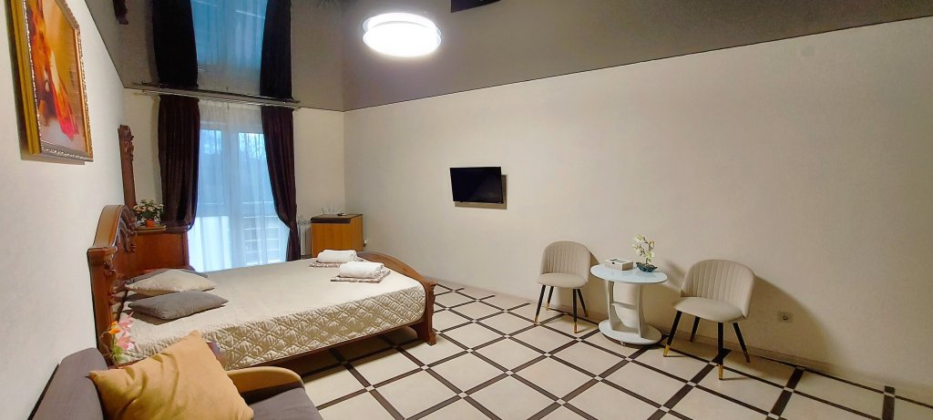 Suite junior cuádruple Confort con balcón Antre Guest house