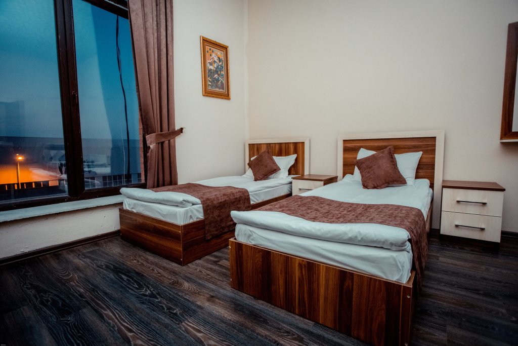 Кровать в общем номере Grand Qafqaz Hostel