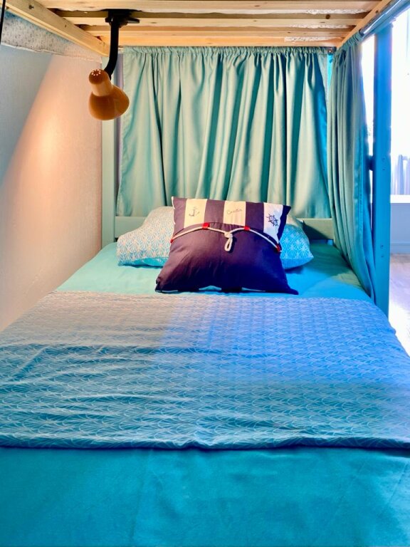 Кровать в общем номере (мужской номер) Хостел Compass mini hotel