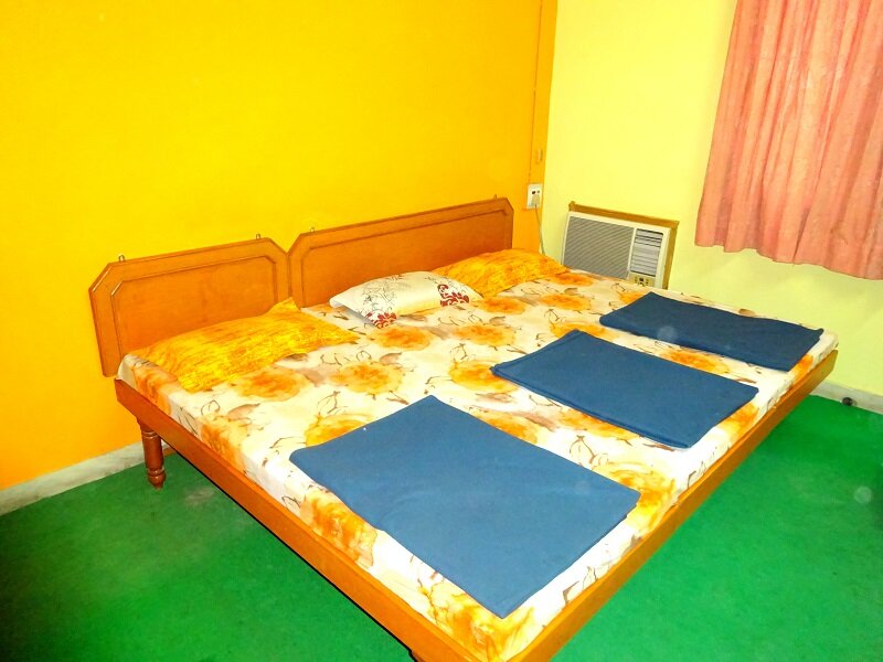 Deluxe Triple room Shree Shantinath Palace by Sky Stays Hotel