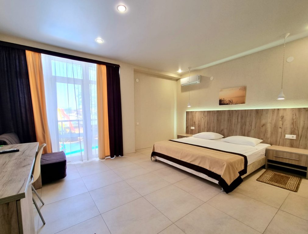 Standard famille chambre avec balcon HELIOPARK Aqua Resort