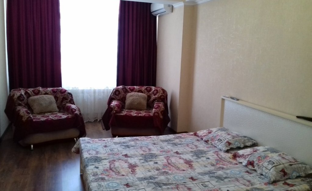 Апартаменты с 2 комнатами с видом на город КвартОтель на М.Горького 85Б