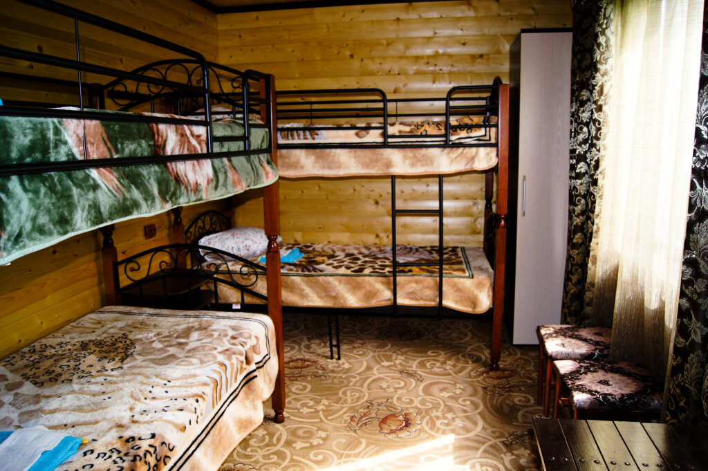 Кровать в общем номере Мини-Отель Camel
