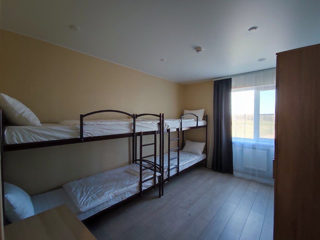 Cama en dormitorio compartido Aysberg Hotel