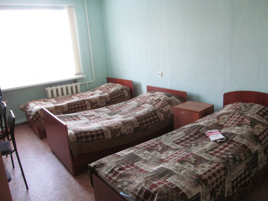 Кровать в общем номере (мужской номер) с видом на город Гостиница Чусовская
