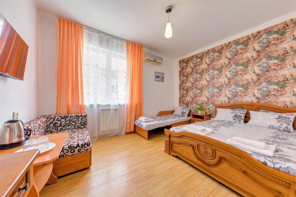 Classique quadruple chambre Ruslan Guest House