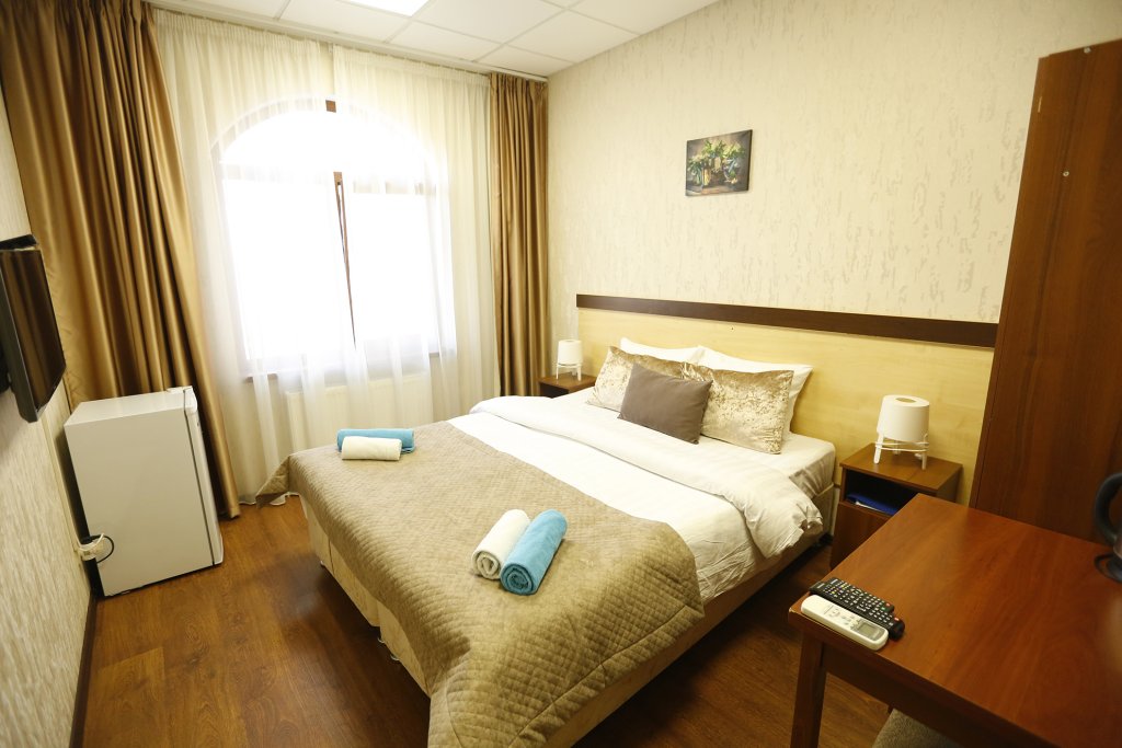 2 Bedrooms Superior Quadruple room with city view Passazh Hotel