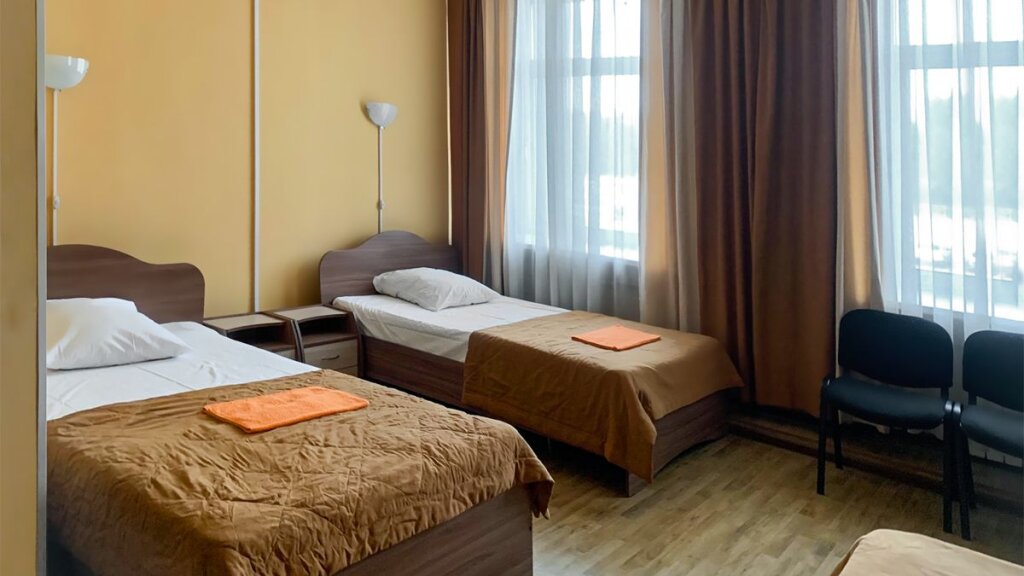 Bett im Wohnheim mit Blick Smart Hotel KDO Ulan-Ude Hotel