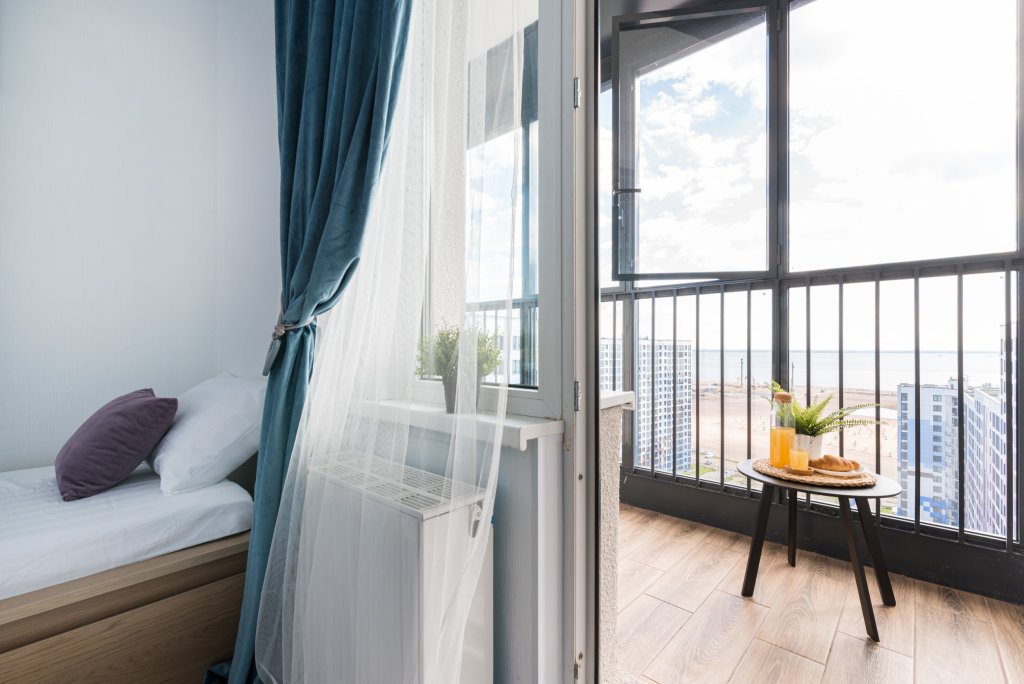 Апартаменты с 2 комнатами с балконом и с красивым видом из окна Апартаменты Морской Фасад