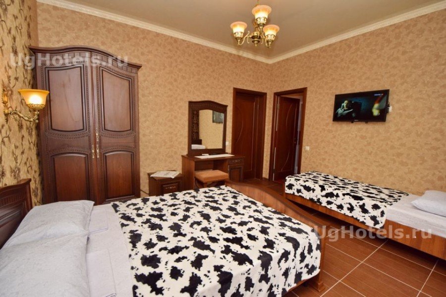 Classique triple chambre Di-Mariya Guest House