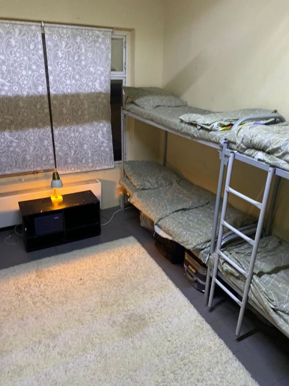 Кровать в общем номере Хостел Мира