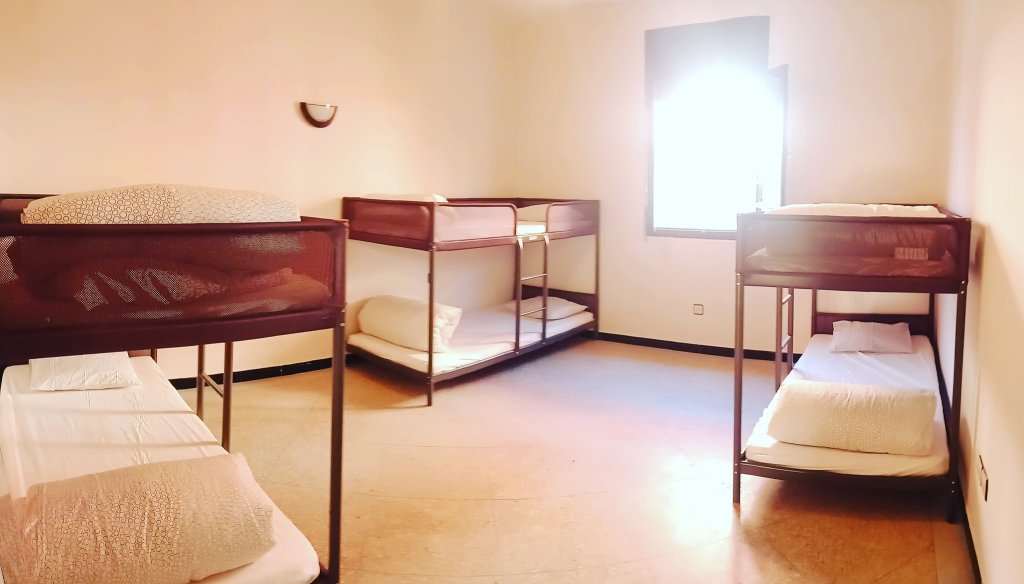 Кровать в общем номере (женский номер) V&D Tamraght Surfers Hostel