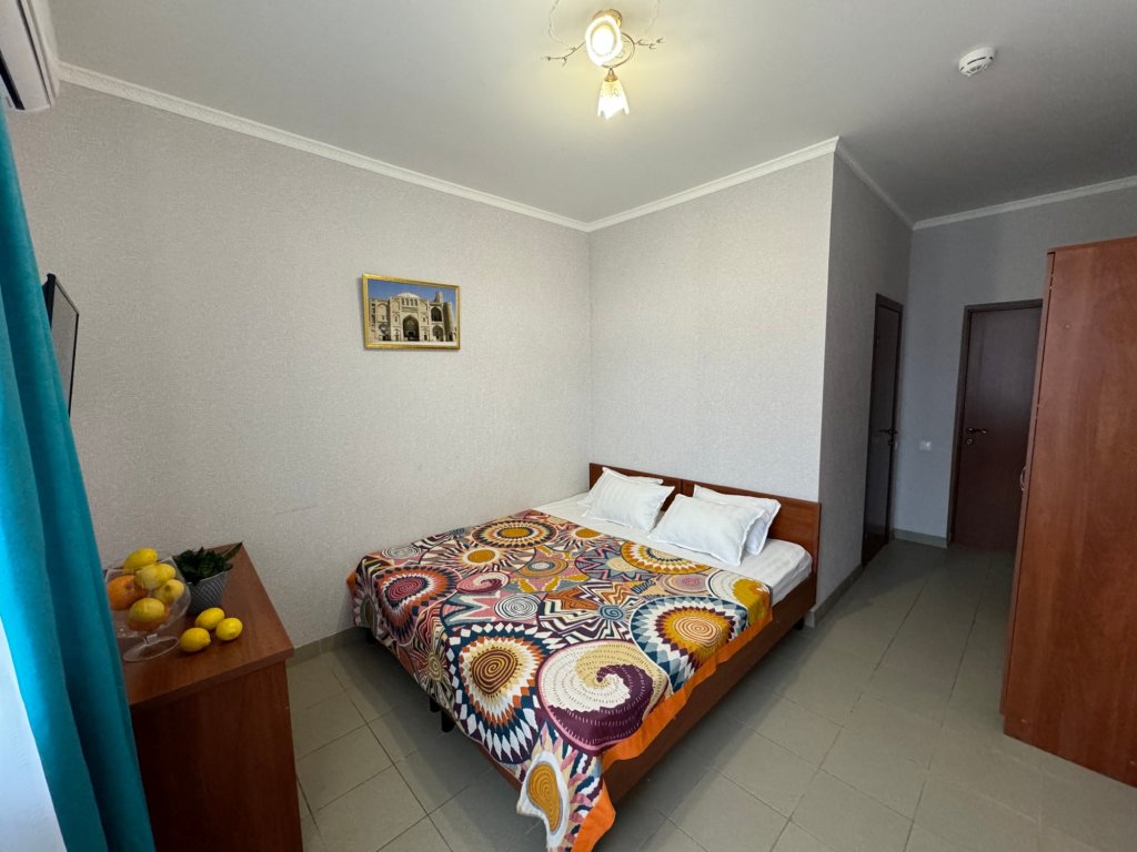 Confort double chambre avec balcon Отель Бухара
