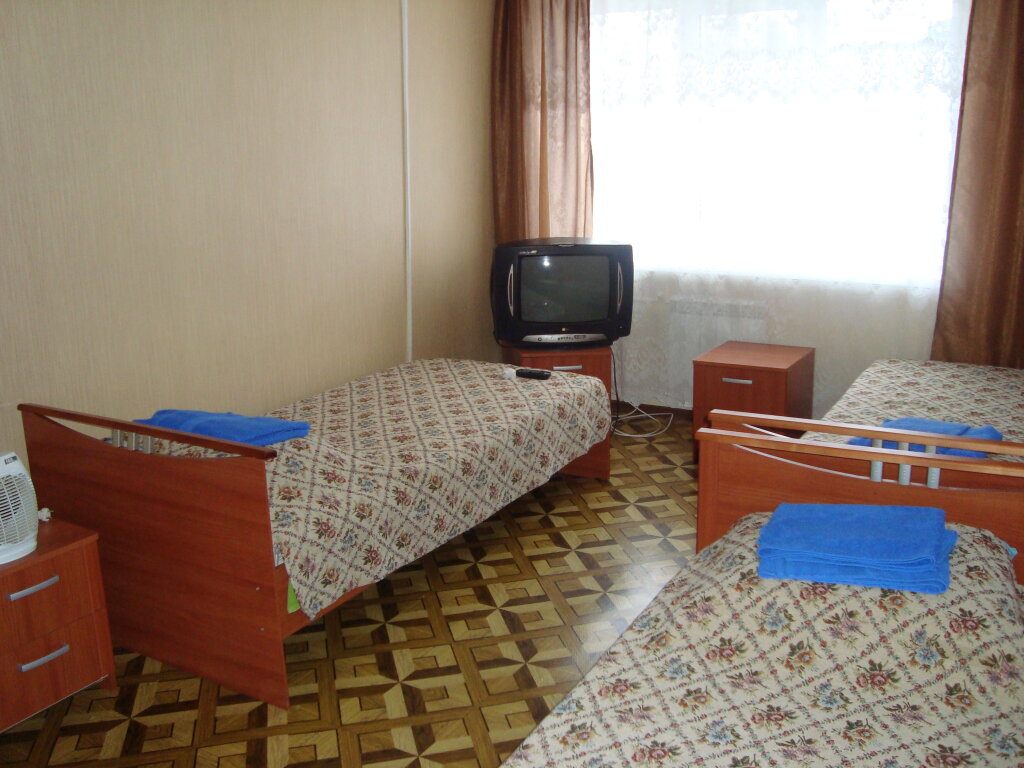 Кровать в общем номере Отель Медведица