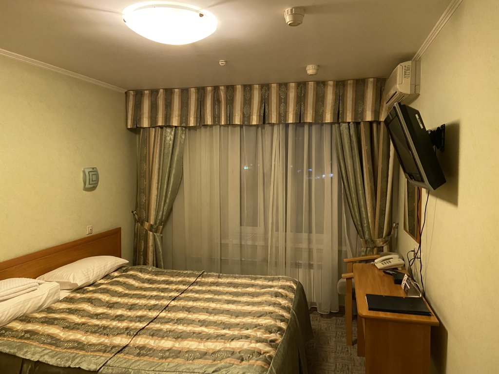 Quadruple Family room with city view Vash Voshod Hotel