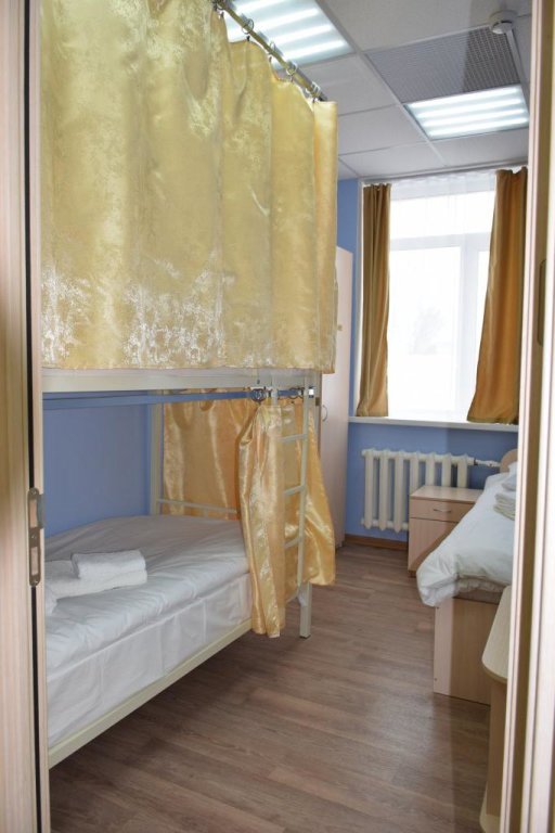Кровать в общем номере Хостел Паратунка