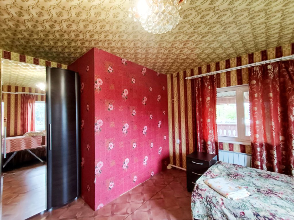Habitación cuádruple Clásica con vista a la montaña Na Traktovoy Guest house