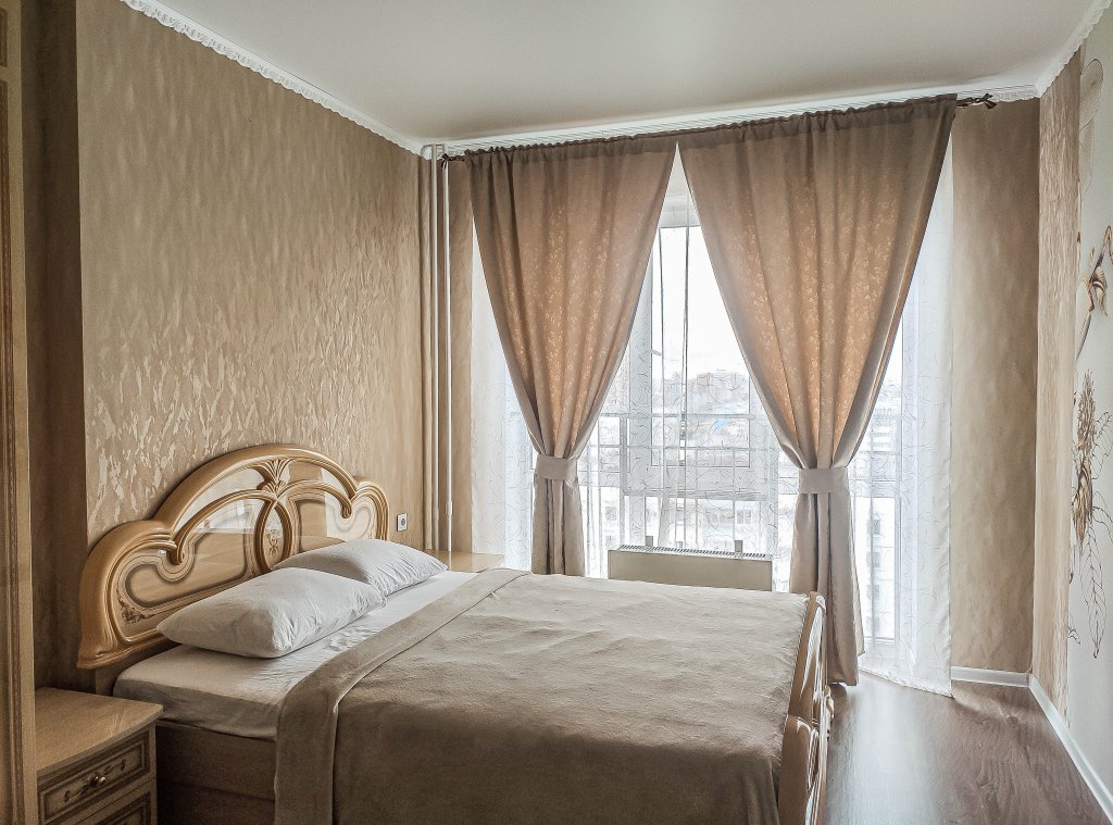 Suite 2 dormitorios con balcón y con vista UYUTNYYe s VIDOM vozle AKVAPARKA i TSENTRA Kazani ot seti "Rushouse" (RusKhaus) Flat